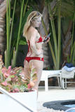 Kate Hudson shows her perfect ass in tiny thong bikini by pool in Miami