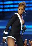 th_59563_celebrity-paradise.com-The_Elder-Rihanna_2010-02-04_-_Pepsi_Super_Bowl_Fan_Jam_in_Miami_8295_122_204lo.jpg